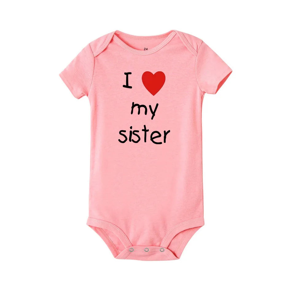 adorable i heart my sister pink short sleeve baby romper